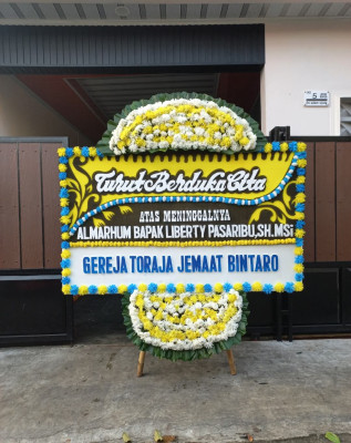 Papan Bunga Duka di Kuningan